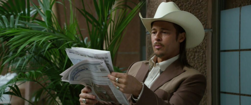 The Counselor - Ridley Scott - Brad Pitt - Westray - newspaper - hotel - cowboy hat