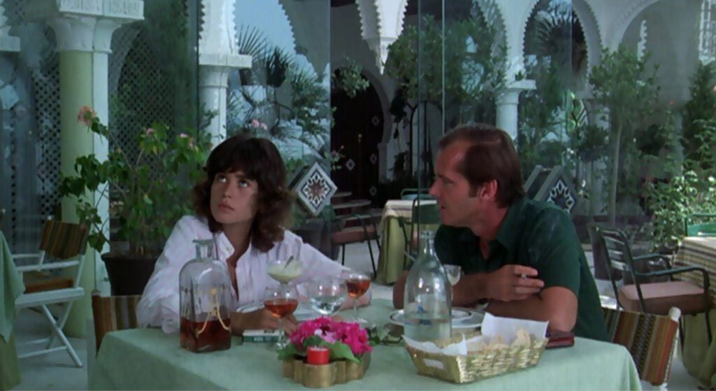 The Passenger - Michelangelo Antonioni - Maria Schneider - Jack Nicholson - David Locke - hotel dining room - restaurant - Spain - table
