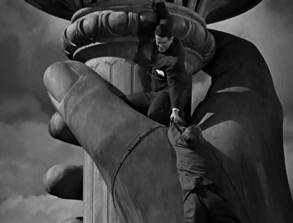 Saboteur - Alfred Hitchcock - Robert Cummings - Norman Lloyd - Barry Kane - Frank Fry - Statue of Liberty torch - hand